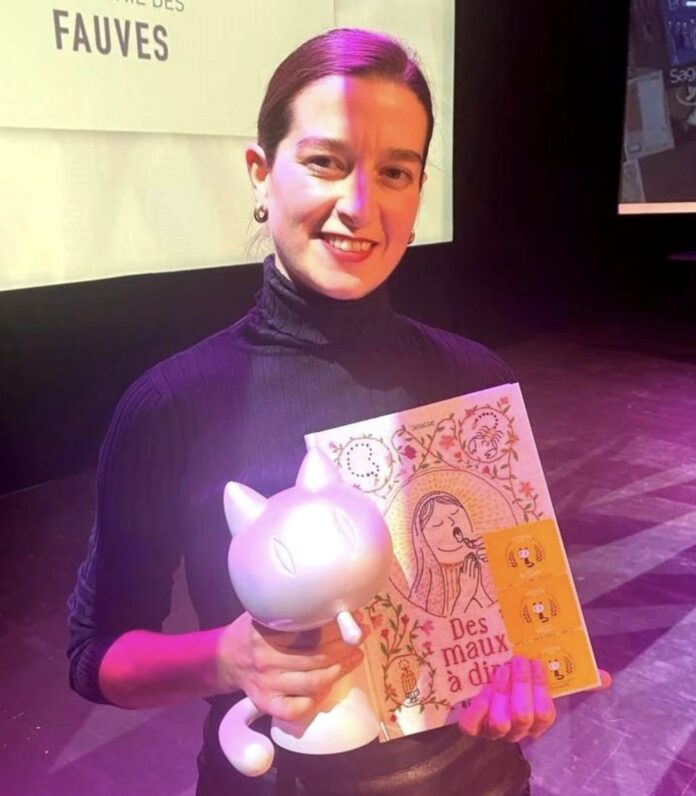 Bea Lema recibindo un premio da TV francesa